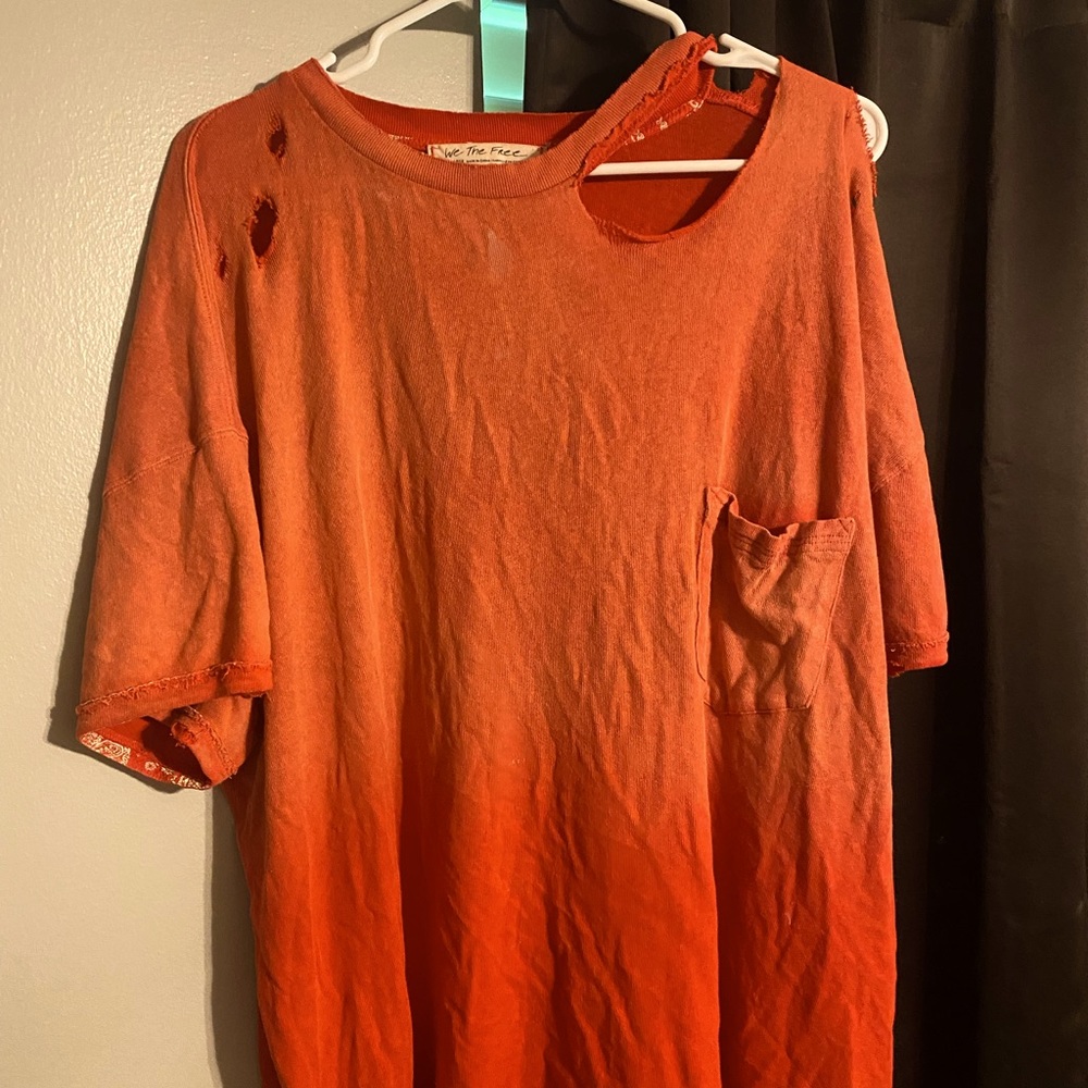 Free people “distressed” cutout oversized tee